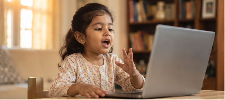 4-year-old Indian girl speaking animatedly during a live HOSS phonics class at home